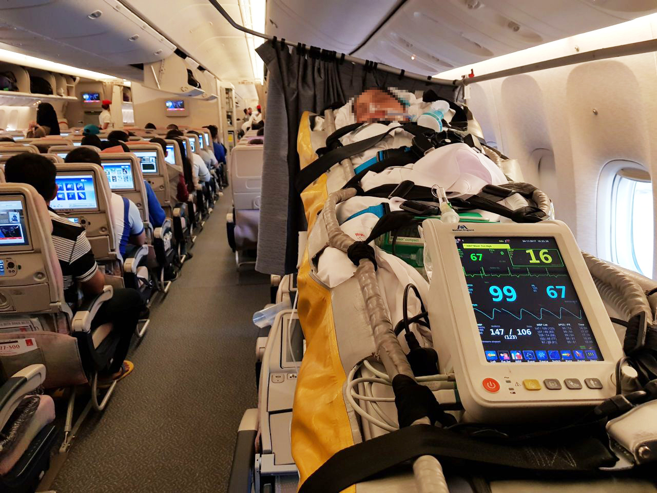 The patient is being assisted in transportation. Air Ambulance 1
